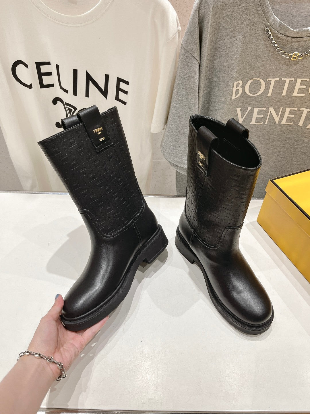 FENDI 25S ANKLE BOOTS IN BLACK COWHIDE LOGO EMBOSSING