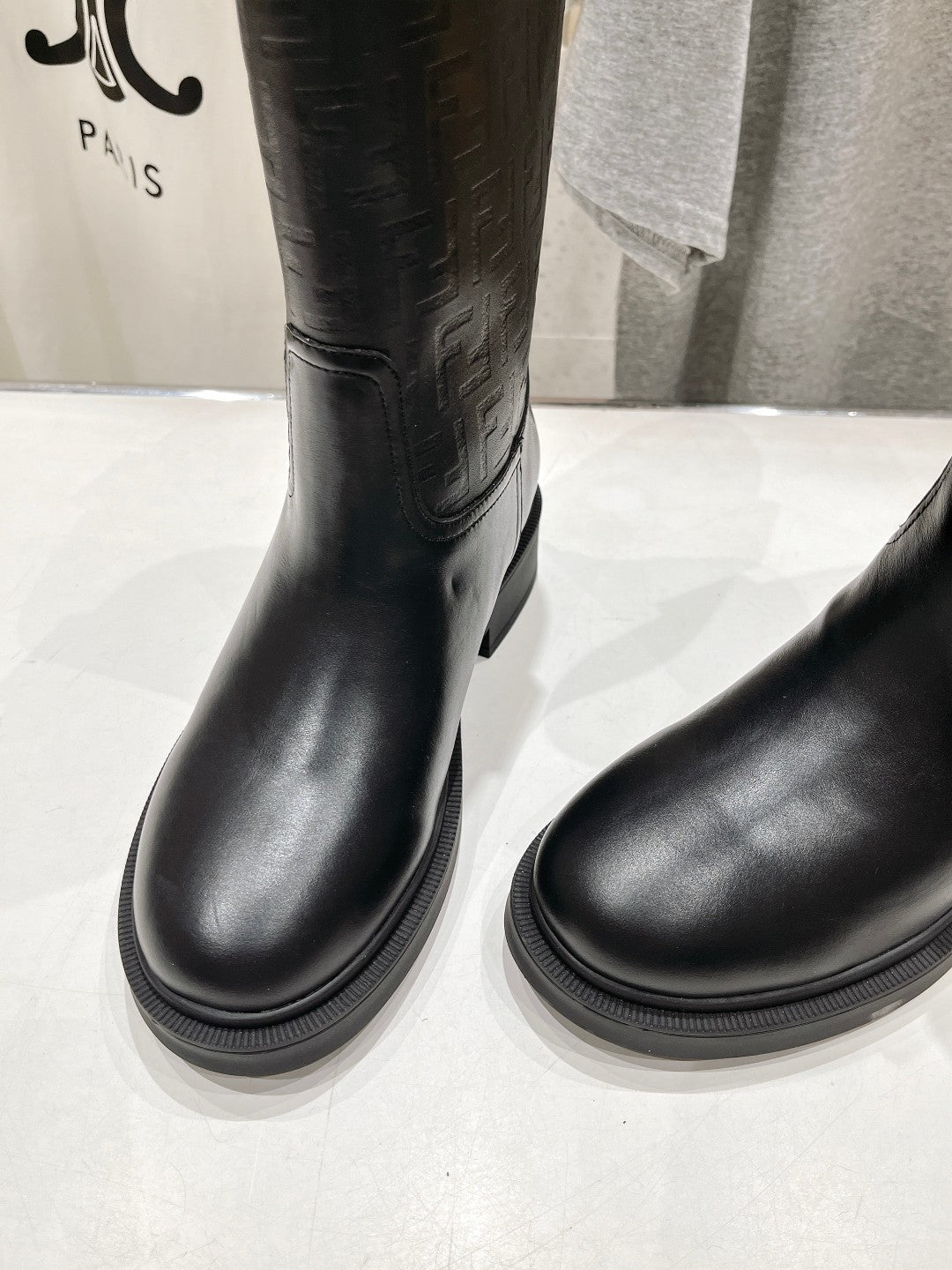 FENDI 25S ANKLE BOOTS IN BLACK COWHIDE LOGO EMBOSSING