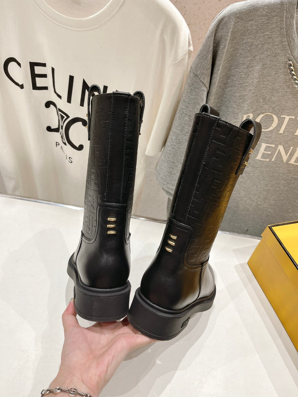 FENDI 25S ANKLE BOOTS IN BLACK COWHIDE LOGO EMBOSSING