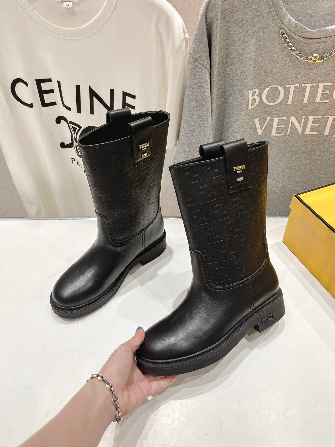 FENDI 25S ANKLE BOOTS IN BLACK COWHIDE LOGO EMBOSSING