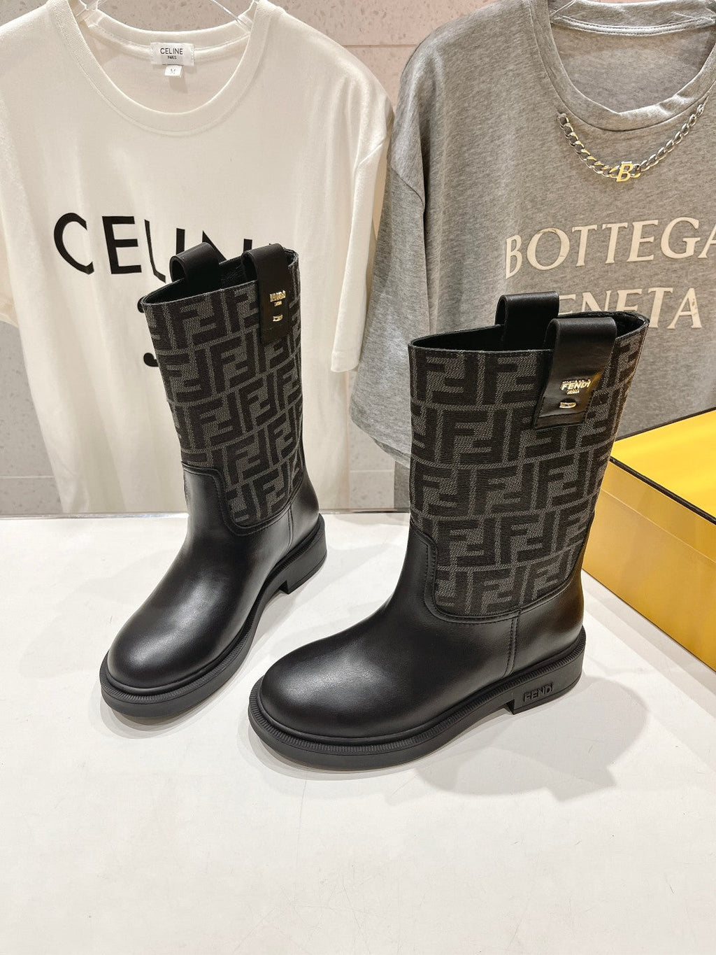 FENDI 25S ANKLE BOOTS IN BLACK COWHIDE AND CANVAS LOGO EMBOSSING