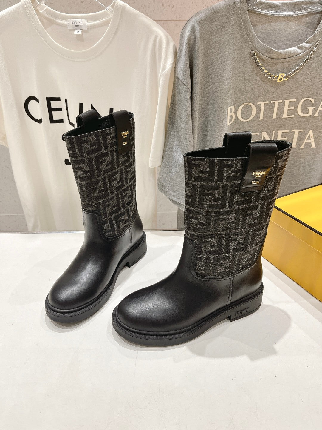 FENDI 25S ANKLE BOOTS IN BLACK COWHIDE AND CANVAS LOGO EMBOSSING