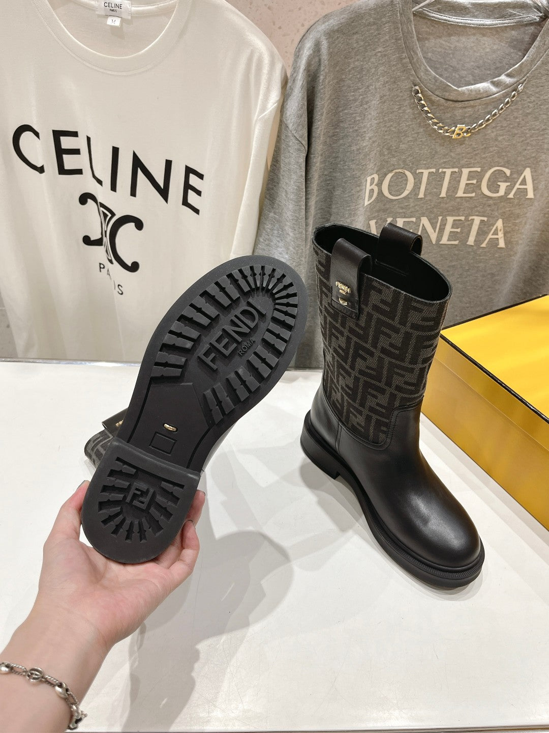 FENDI 25S ANKLE BOOTS IN BLACK COWHIDE AND CANVAS LOGO EMBOSSING