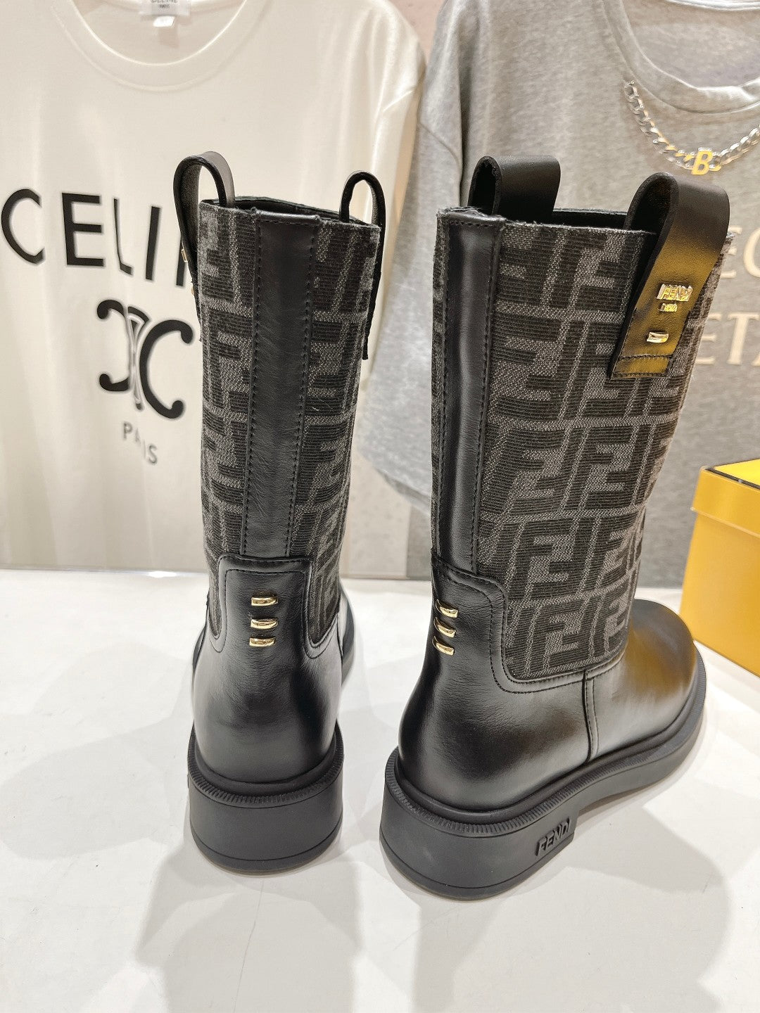 FENDI 25S ANKLE BOOTS IN BLACK COWHIDE AND CANVAS LOGO EMBOSSING