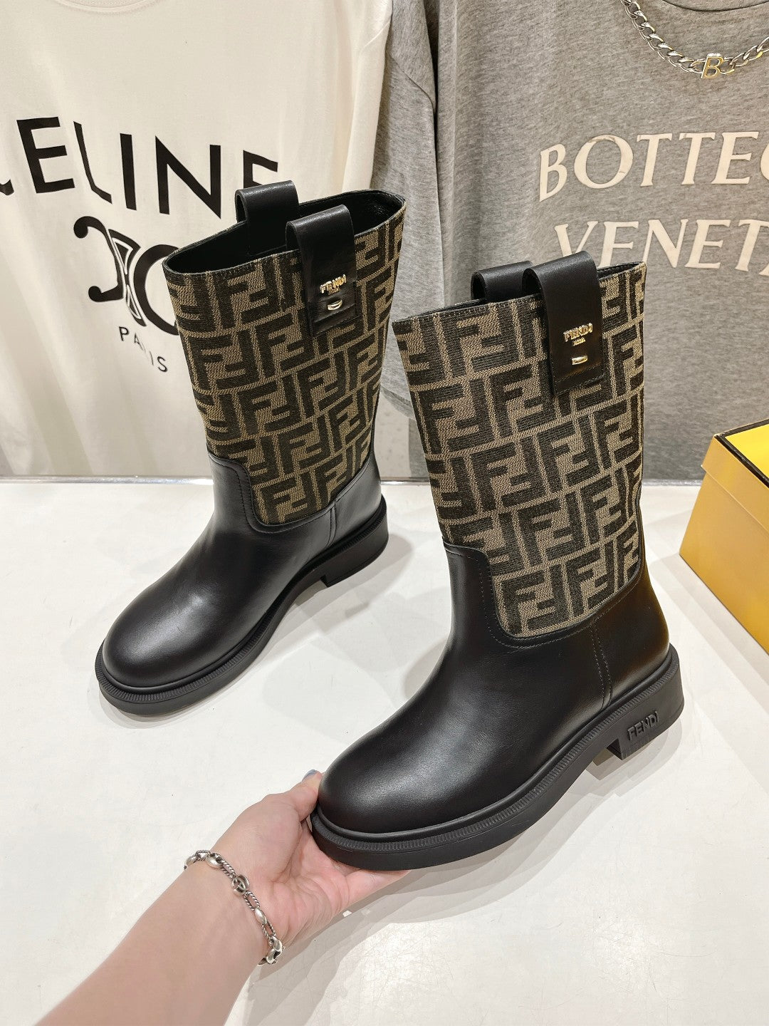 FENDI 25S ANKLE BOOTS IN BLACK COWHIDE AND BROWN CANVAS LOGO EMBOSSING