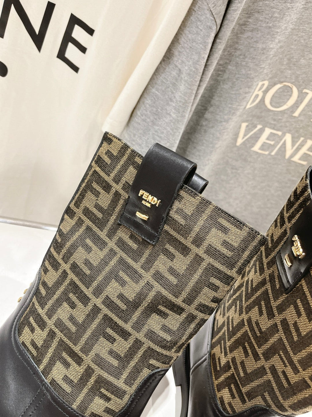 FENDI 25S ANKLE BOOTS IN BLACK COWHIDE AND BROWN CANVAS LOGO EMBOSSING