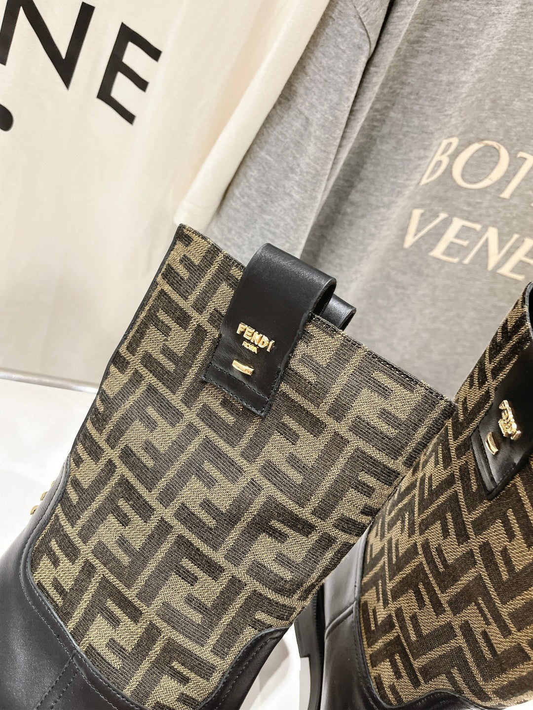 FENDI 25S ANKLE BOOTS IN BLACK COWHIDE AND BROWN CANVAS LOGO EMBOSSING
