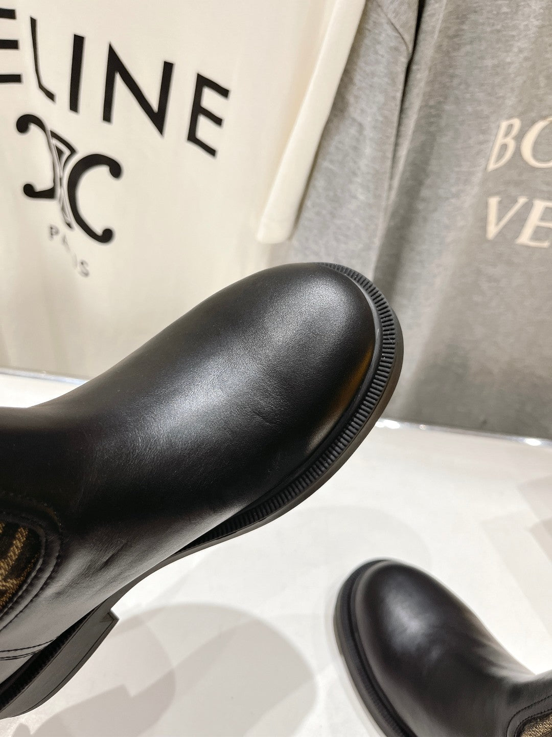 FENDI 25S ANKLE BOOTS IN BLACK COWHIDE AND BROWN CANVAS LOGO EMBOSSING