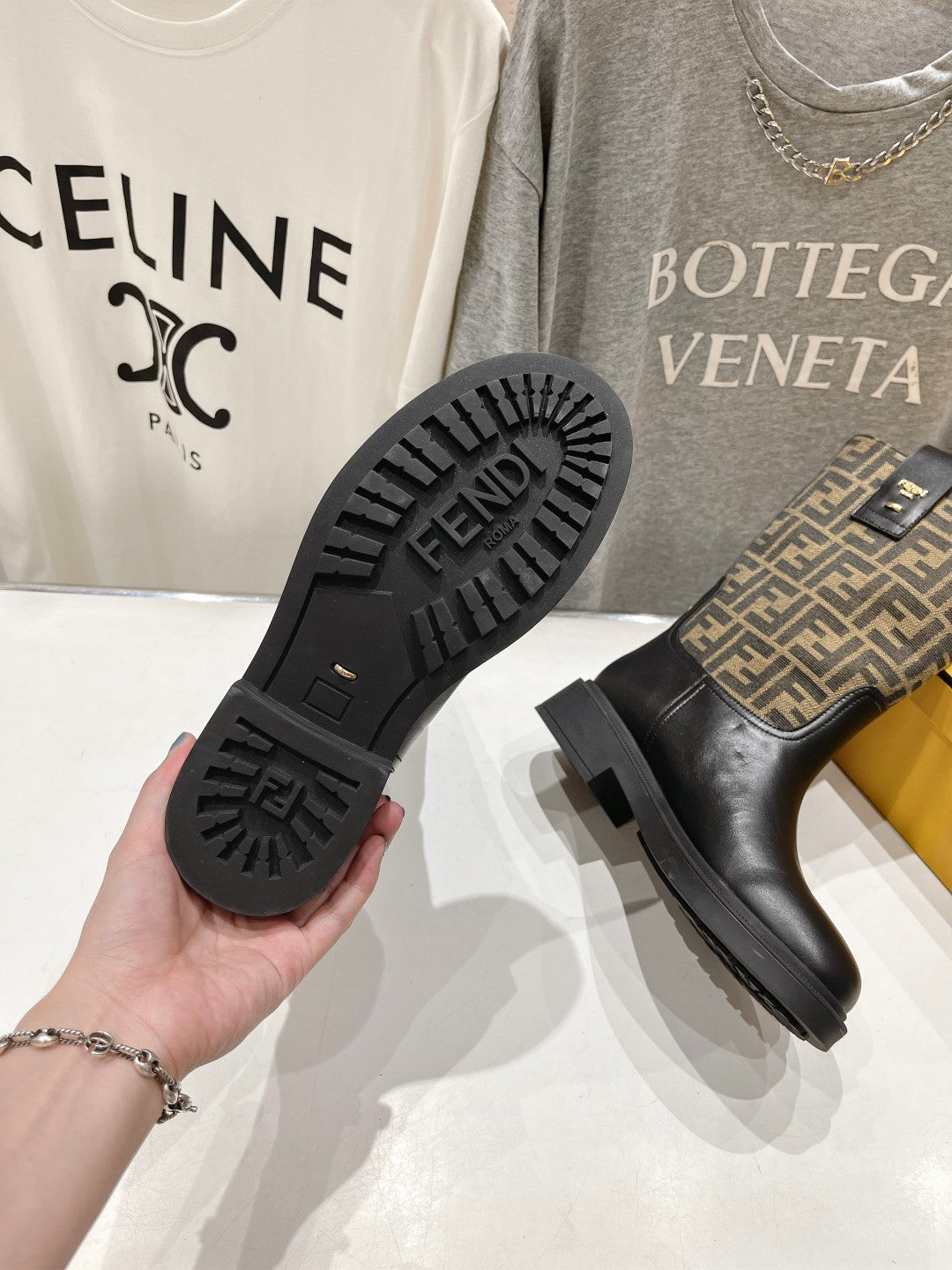 FENDI 25S ANKLE BOOTS IN BLACK COWHIDE AND BROWN CANVAS LOGO EMBOSSING