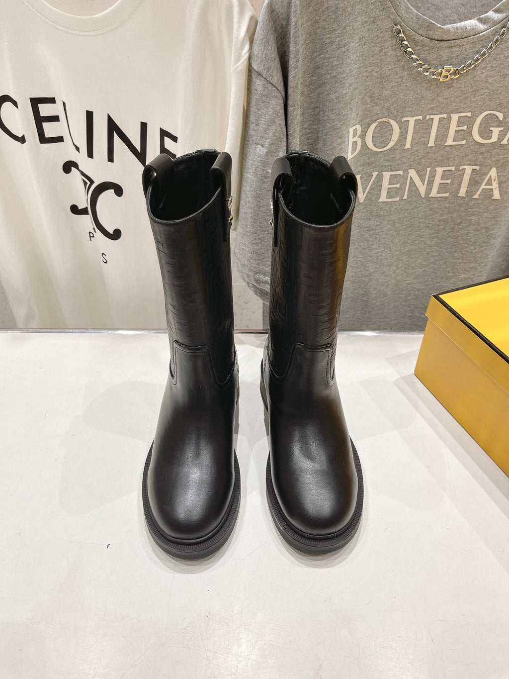FENDI 25S ANKLE BOOTS IN BLACK COWHIDE LOGO EMBOSSING