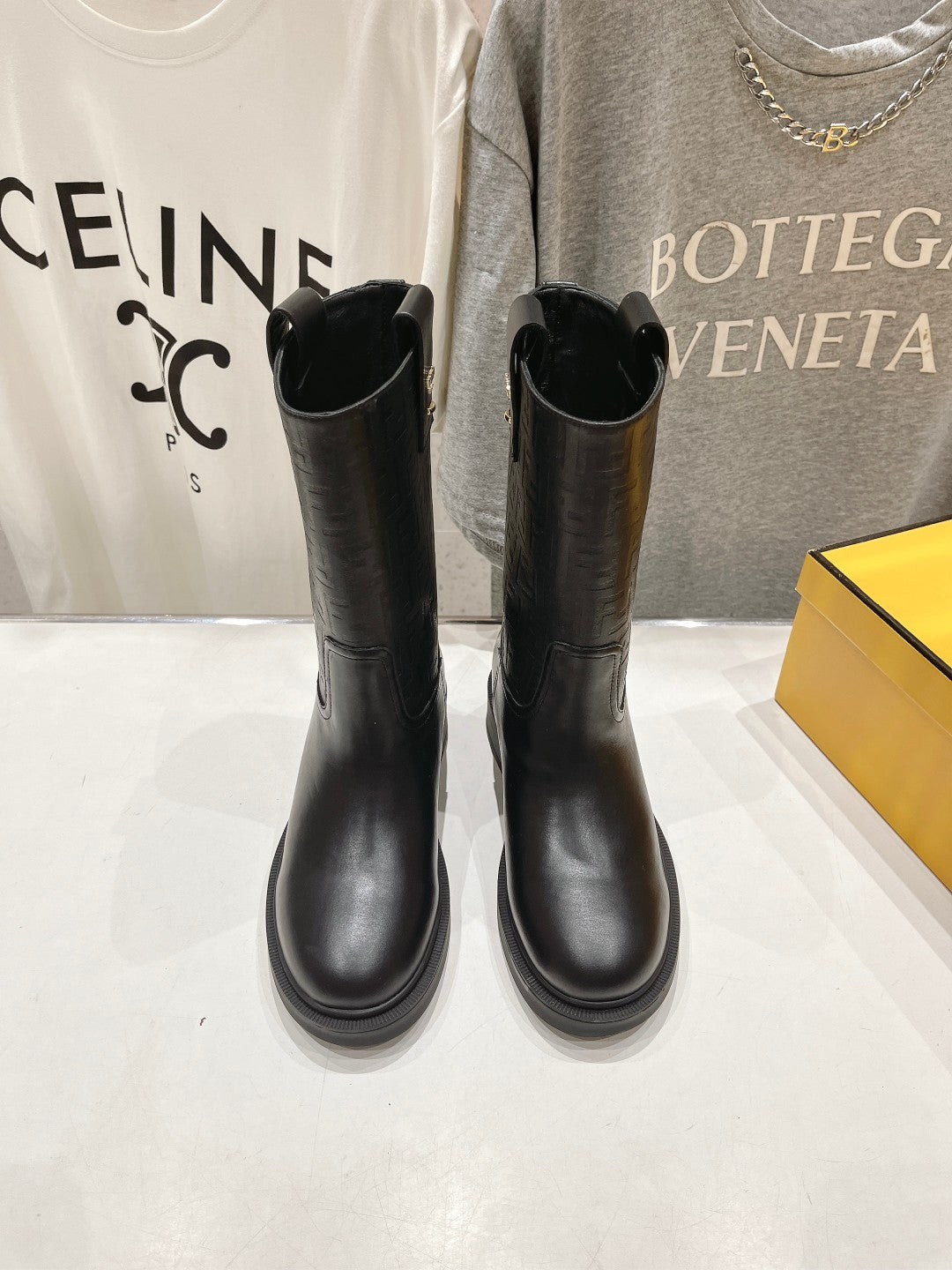 FENDI 25S ANKLE BOOTS IN BLACK COWHIDE LOGO EMBOSSING