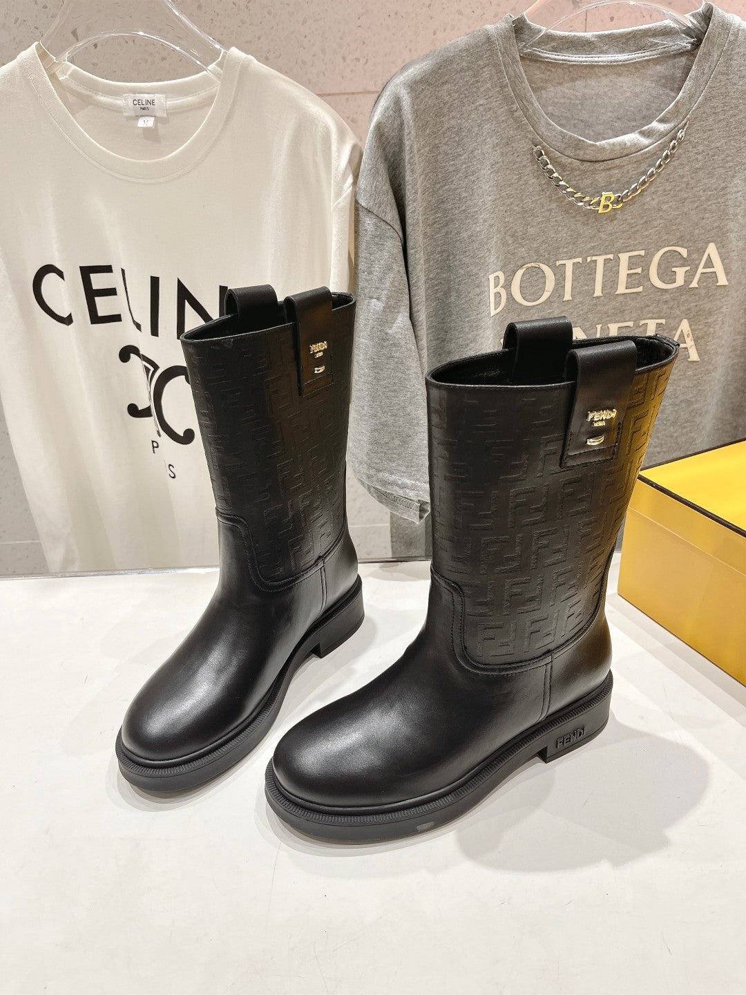 FENDI 25S ANKLE BOOTS IN BLACK COWHIDE LOGO EMBOSSING