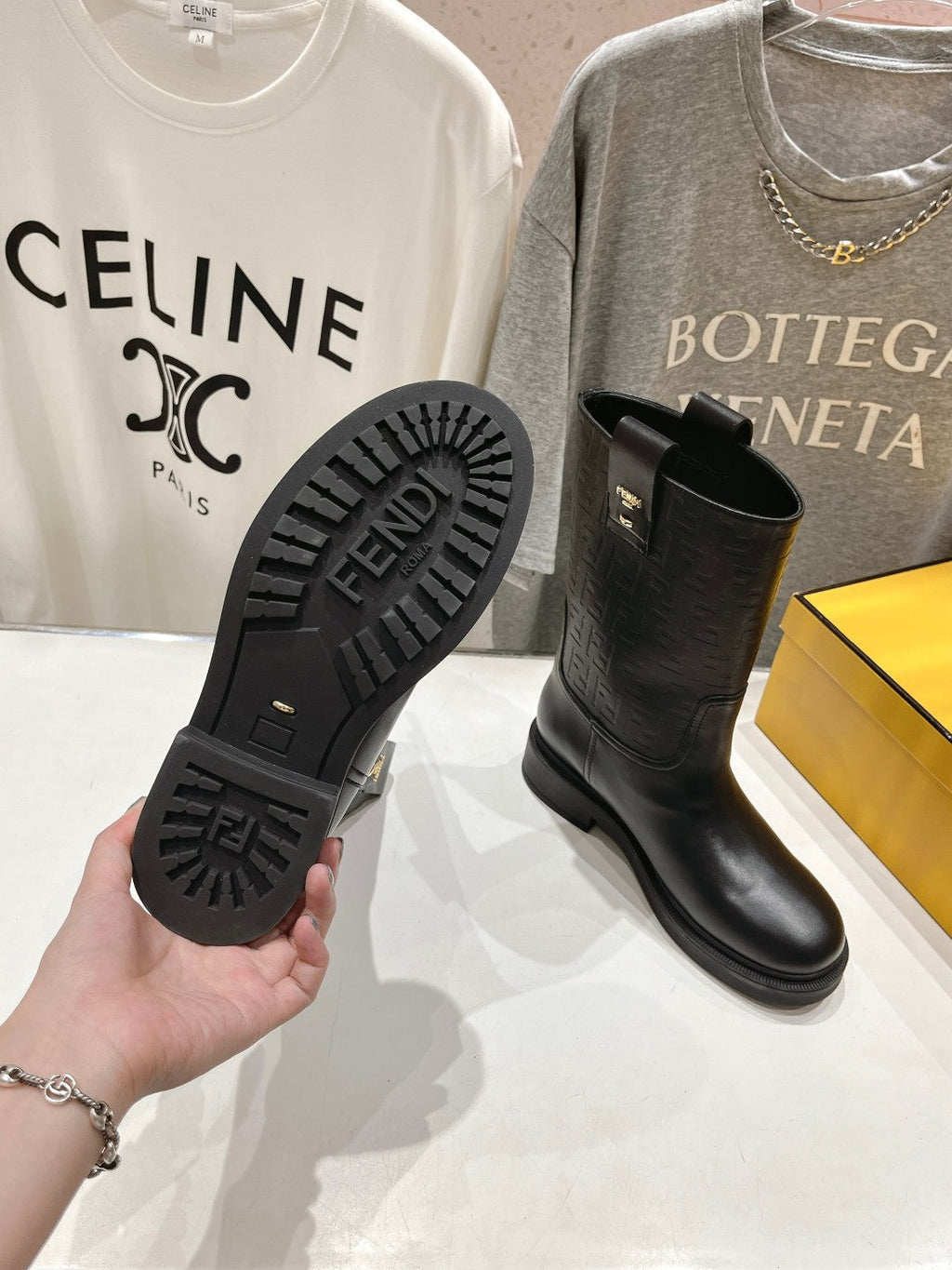 FENDI 25S ANKLE BOOTS IN BLACK COWHIDE LOGO EMBOSSING