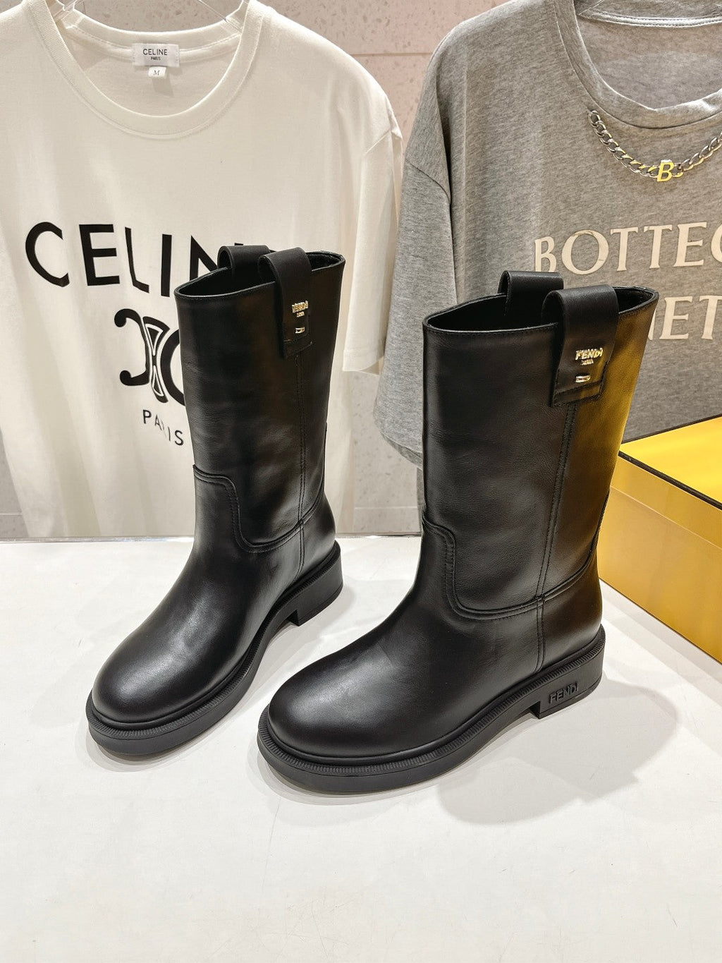 FENDI 25S ANKLE BOOTS IN BLACK COWHIDE