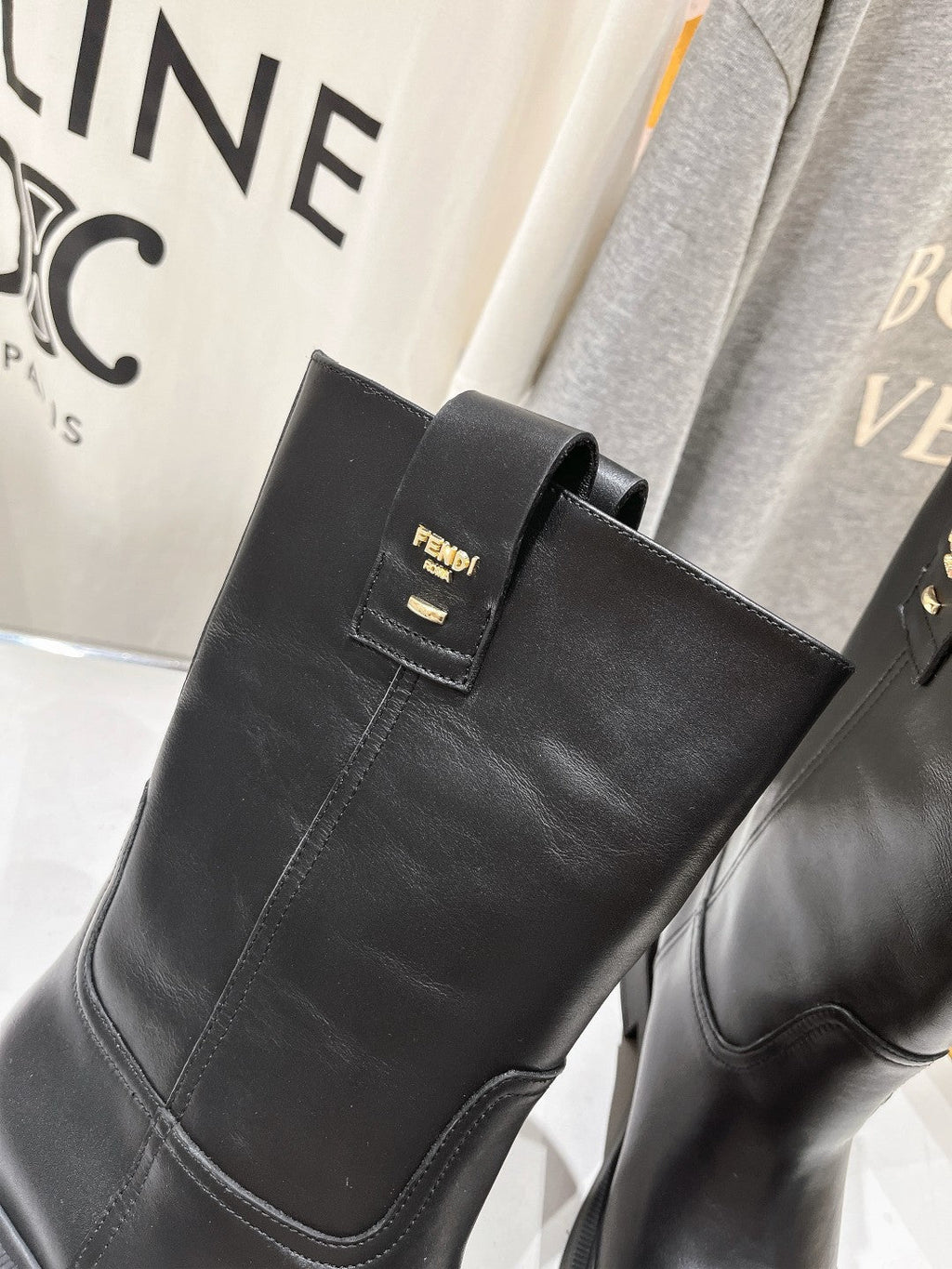 FENDI 25S ANKLE BOOTS IN BLACK COWHIDE