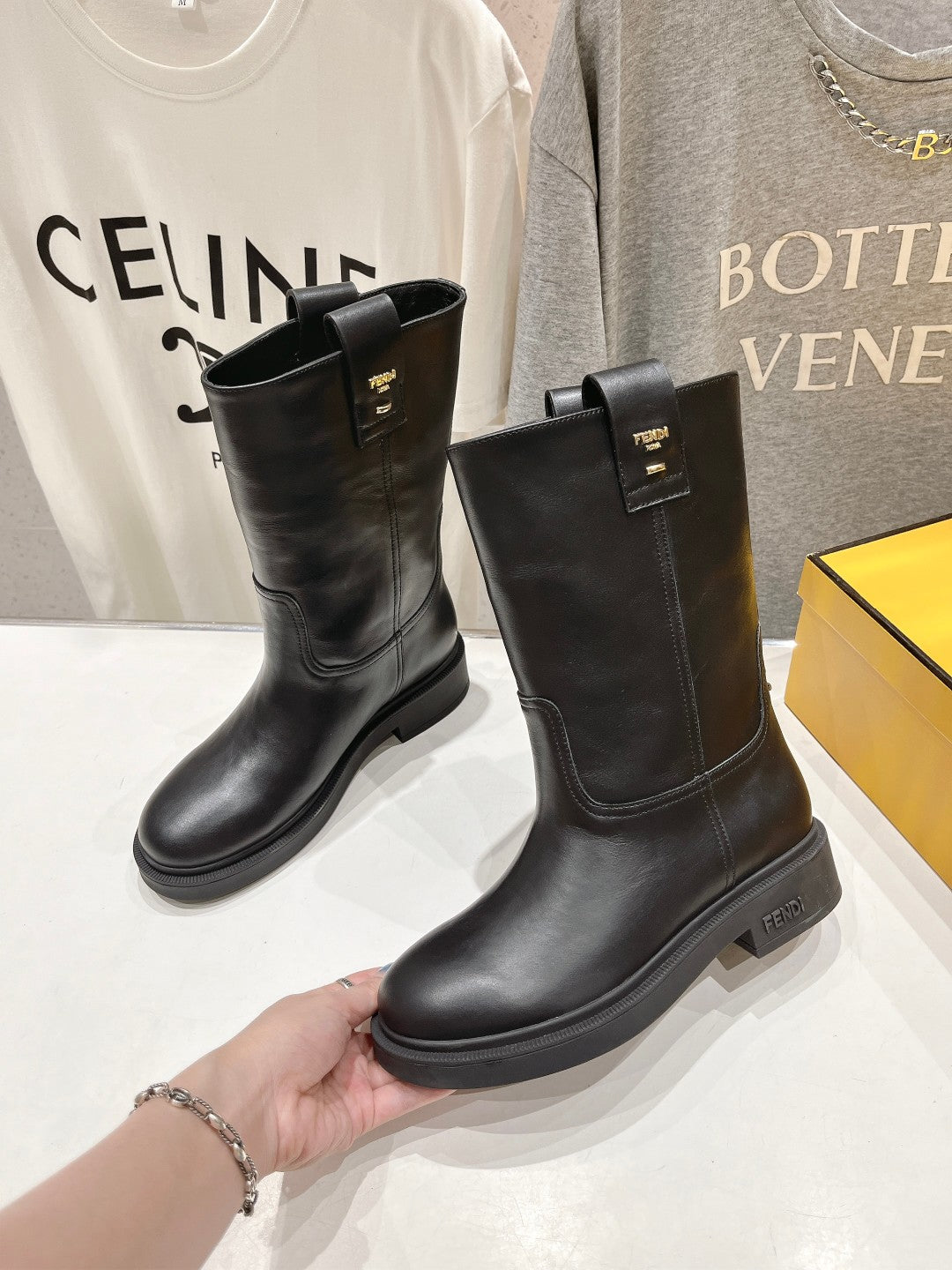 FENDI 25S ANKLE BOOTS IN BLACK COWHIDE