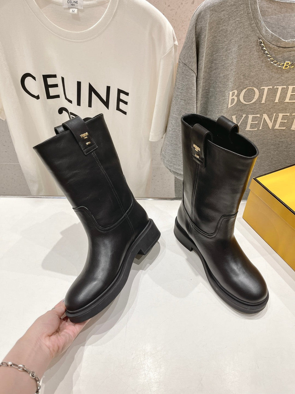 FENDI 25S ANKLE BOOTS IN BLACK COWHIDE