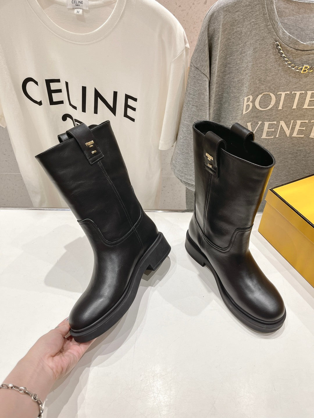 FENDI 25S ANKLE BOOTS IN BLACK COWHIDE