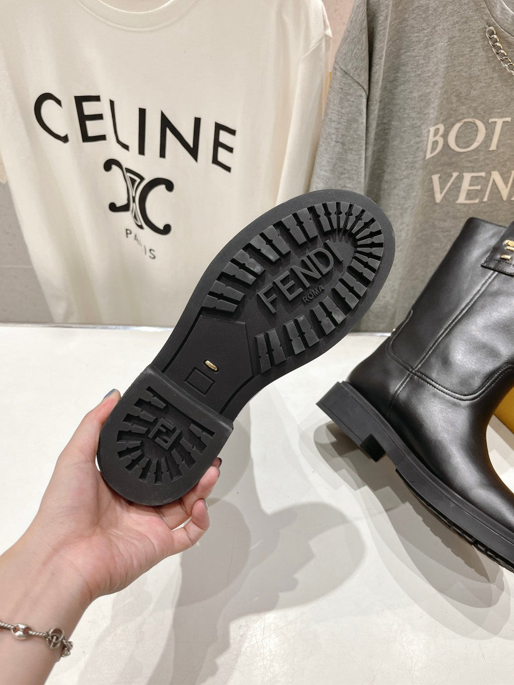 FENDI 25S ANKLE BOOTS IN BLACK COWHIDE
