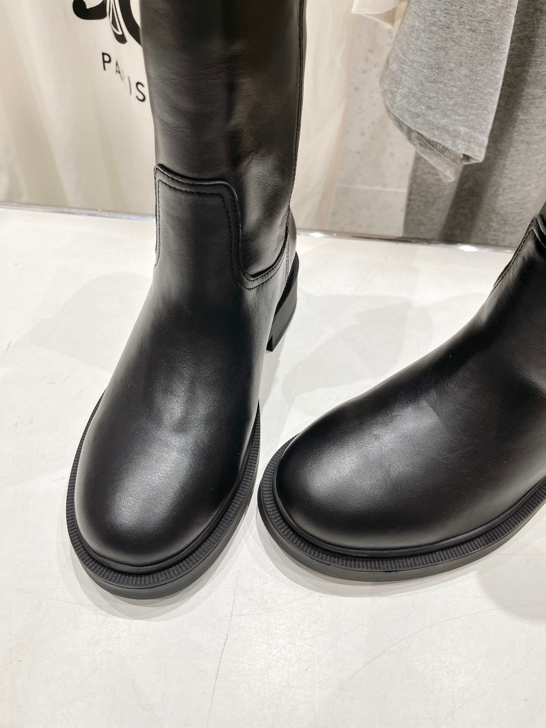 FENDI 25S ANKLE BOOTS IN BLACK COWHIDE