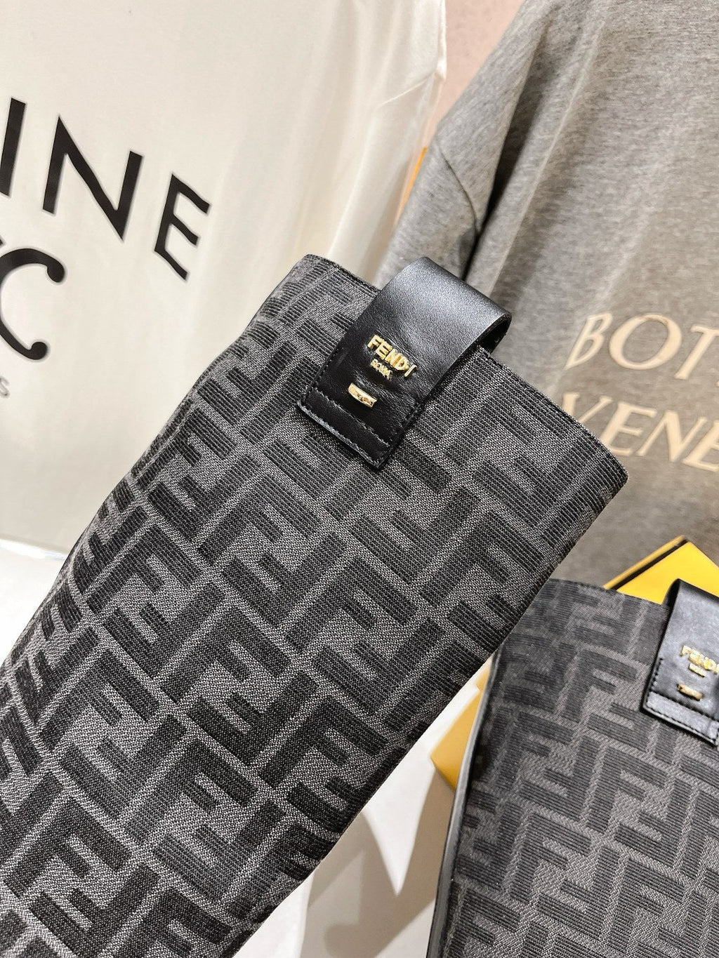 FENDI 25S HIGH BOOTS IN BLACK COWHIDE AND CANVAS LOGO EMBOSSING