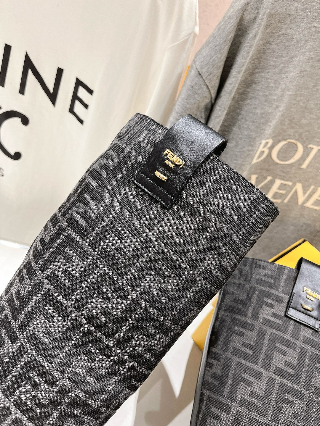 FENDI 25S HIGH BOOTS IN BLACK COWHIDE AND CANVAS LOGO EMBOSSING