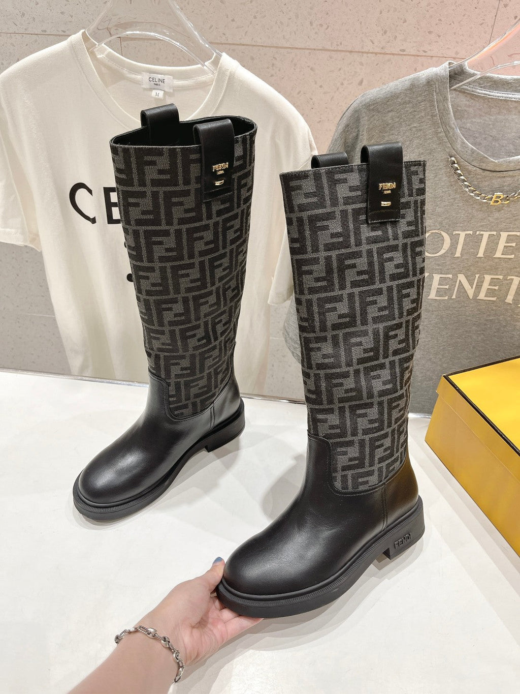 FENDI 25S HIGH BOOTS IN BLACK COWHIDE AND CANVAS LOGO EMBOSSING
