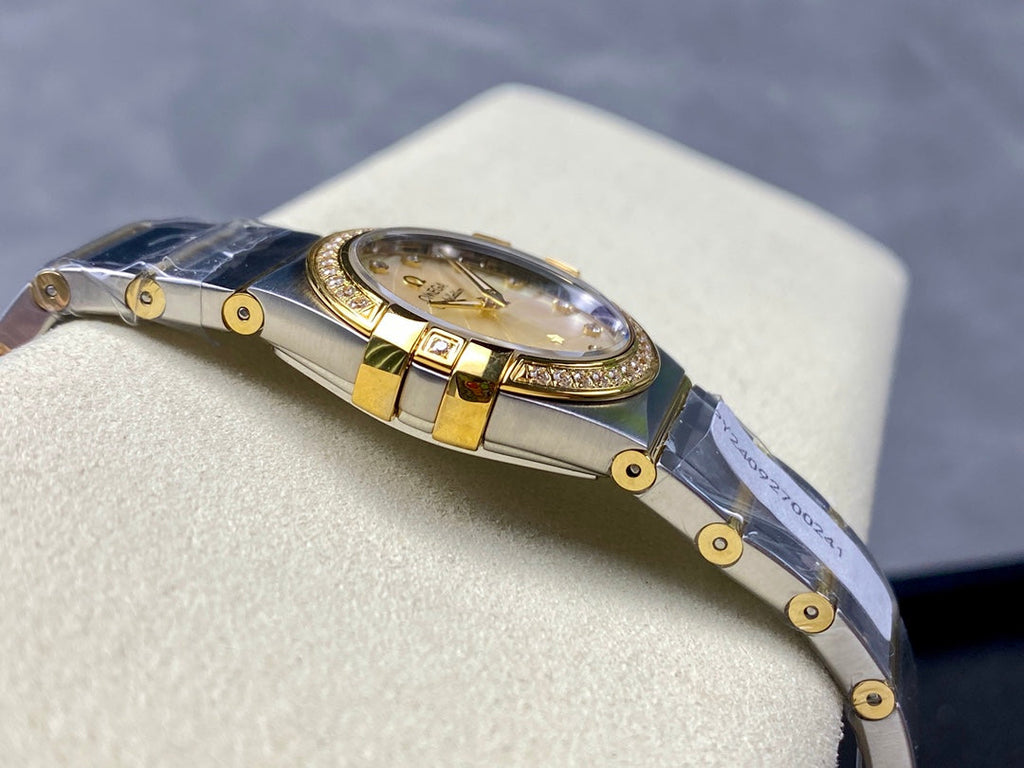 CONSTELLATION PETITE WATCH SILVER AND GOLD CASE WITH CRYSTALS