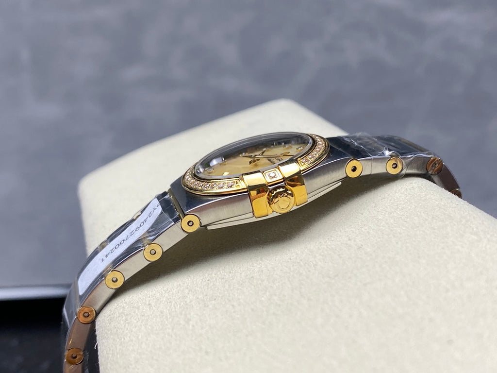 CONSTELLATION PETITE WATCH SILVER AND GOLD CASE WITH CRYSTALS
