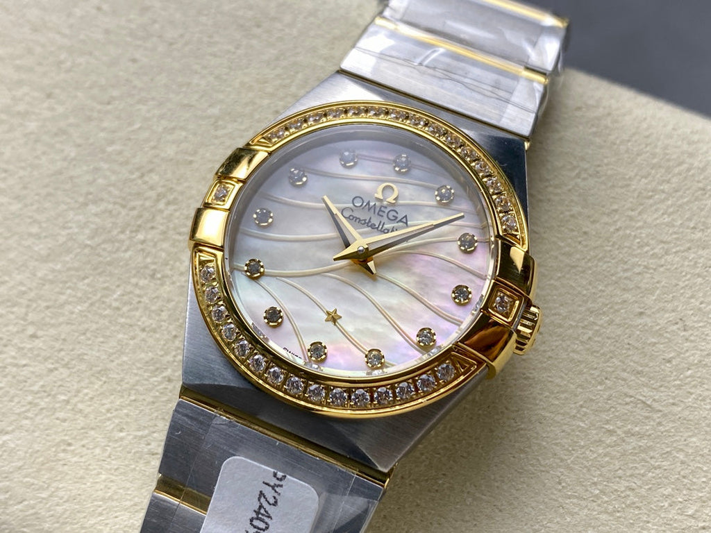 CONSTELLATION PETITE WATCH SILVER AND GOLD CASE WITH CRYSTALS