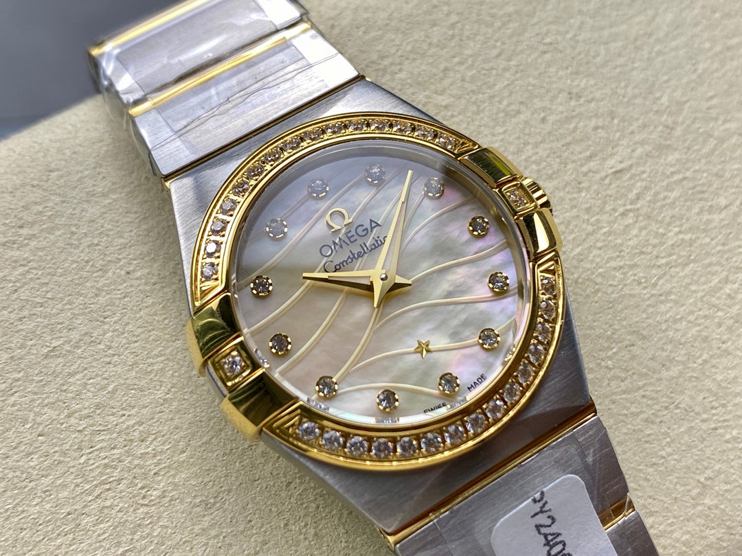 CONSTELLATION PETITE WATCH SILVER AND GOLD CASE WITH CRYSTALS