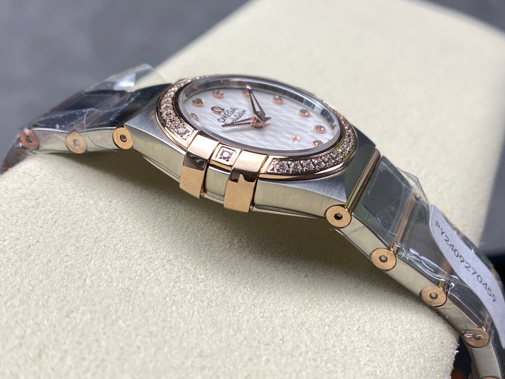 CONSTELLATION PETITE WATCH SILVER AND ROSE GOLD CASE WITH CRYSTALS