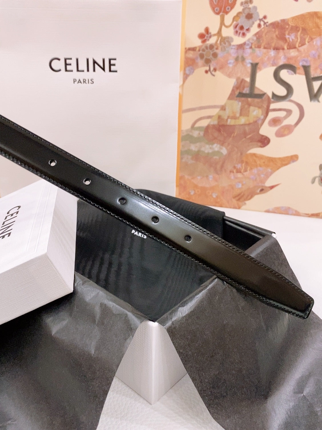 CELINE 25S BELT 25MM REVERSIBLE TRIOMPHE IN BLACK WHITE CALFSKIN 565542