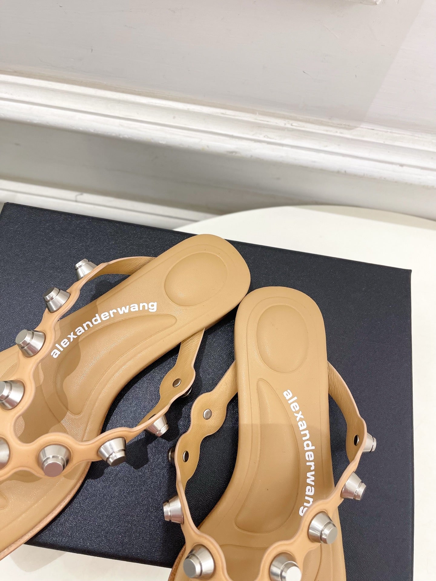 RHODES STUDDED THONG SANDALS IN BROWN CALFSKIN
