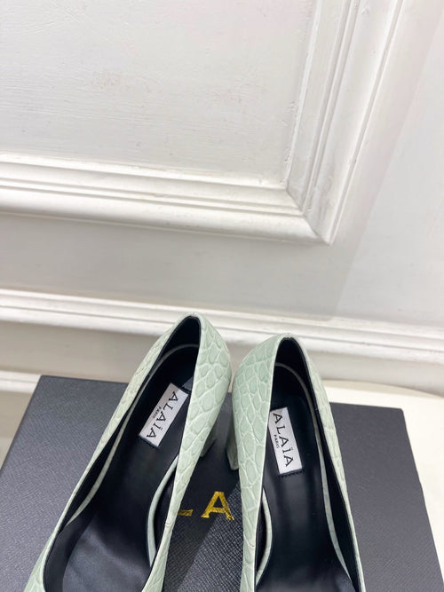 ALAIA 26S HIGH HEELS 95 MM IN SAGE GREEN CROCODILE-EMBOSSED CALFSKIN