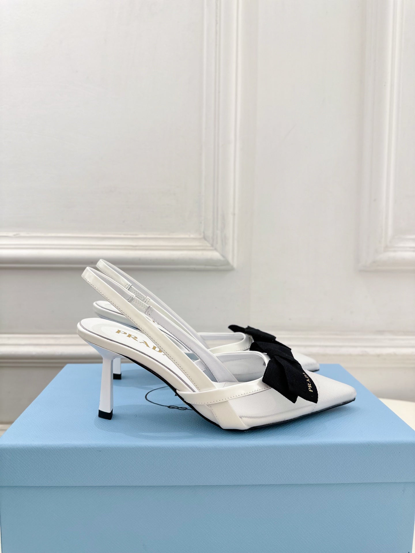 PRADA 26S POINTED-TOE SLINGBACK HEELS 75MM IN WHITE MESH WITH BLACK BOW
