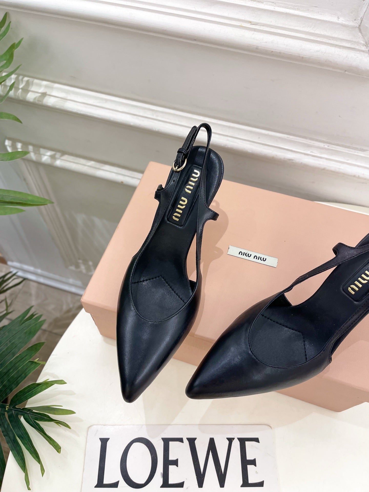 MIUMIU 26S SLINGBACK PUMPS 85MM IN BLACK CALFSKIN