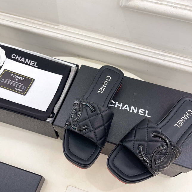 CHANEL 26S FLAT SLIDES IN BLACK LAMBSKIN WITH CC LOGO