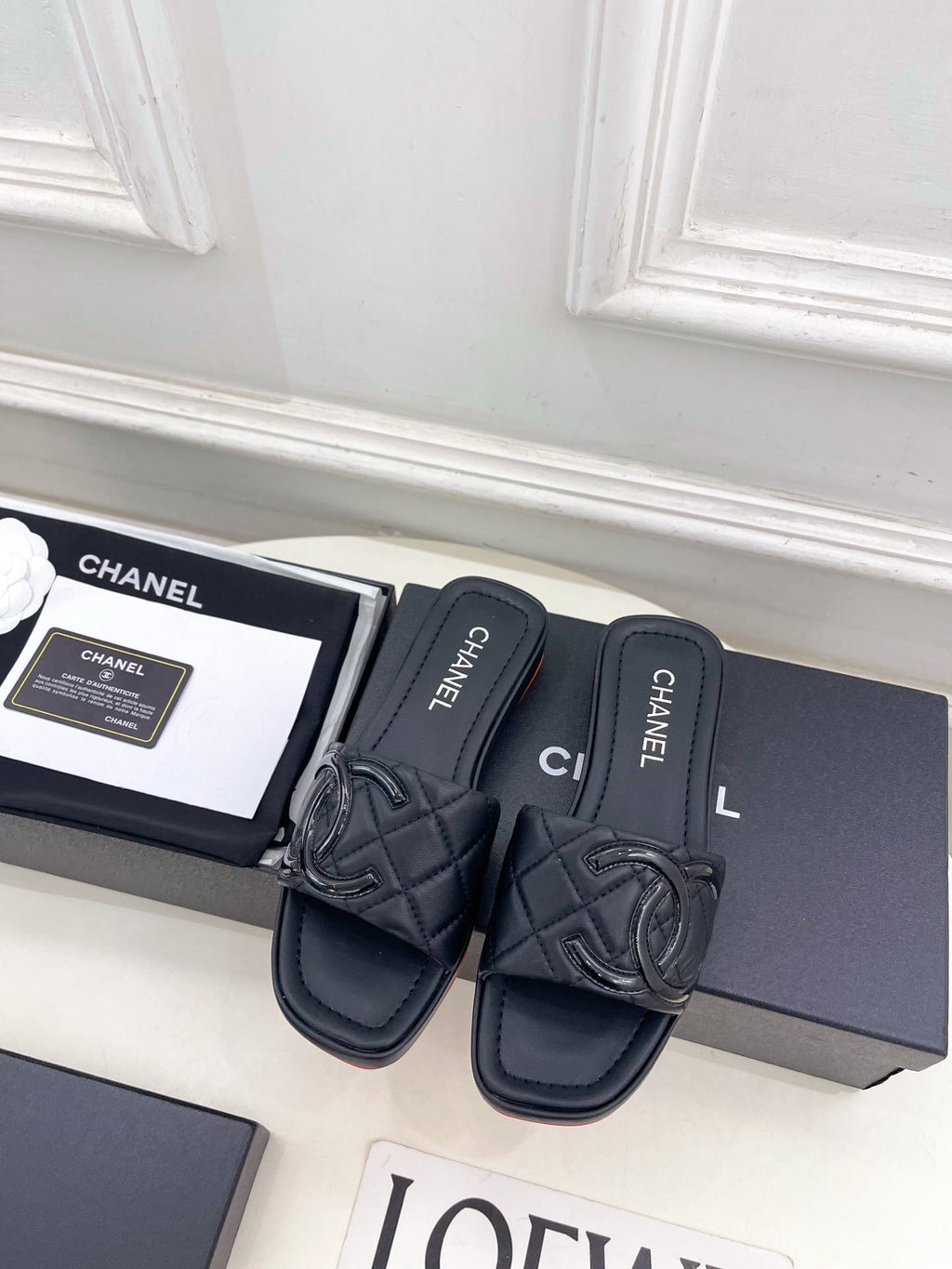 CHANEL 26S FLAT SLIDES IN BLACK LAMBSKIN WITH CC LOGO