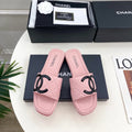 CHANEL 26S FLAT SLIDES IN LIGHT PINK LAMBSKIN WITH BLACK CC LOGO