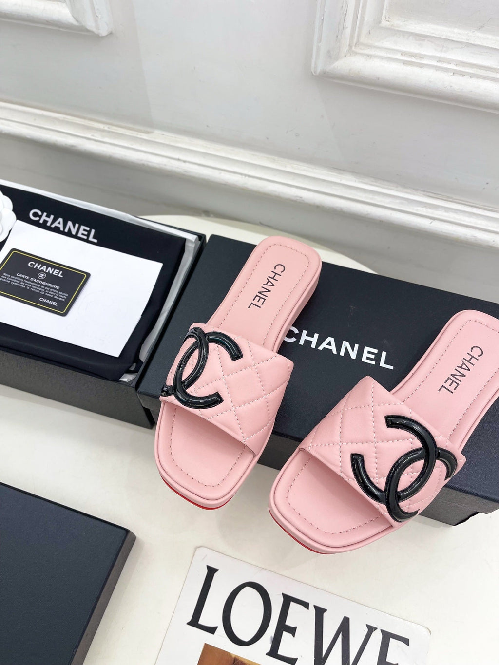 CHANEL 26S FLAT SLIDES IN LIGHT PINK LAMBSKIN WITH BLACK CC LOGO