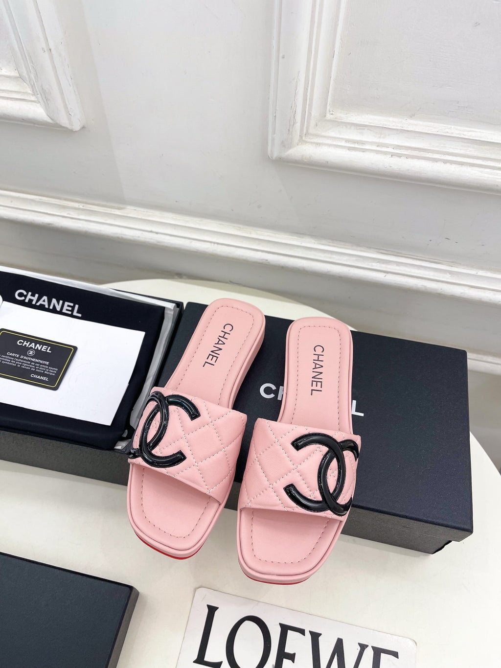 CHANEL 26S FLAT SLIDES IN LIGHT PINK LAMBSKIN WITH BLACK CC LOGO