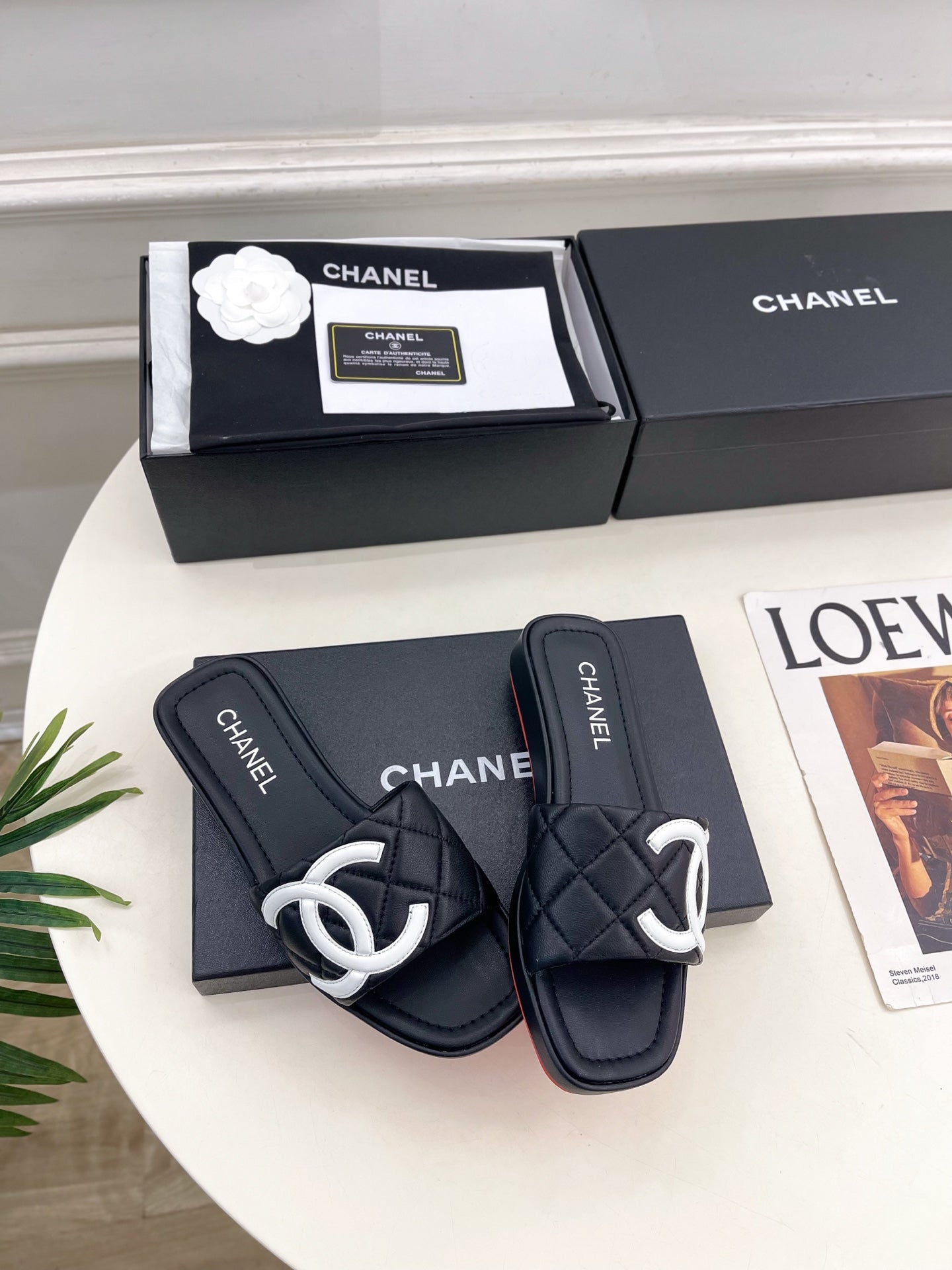 CHANEL 26S FLAT SLIDES IN BLACK LAMBSKIN WITH WHITE CC LOGO