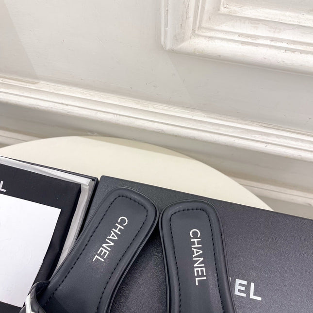 CHANEL 26S FLAT SLIDES IN BLACK LAMBSKIN WITH WHITE CC LOGO