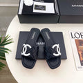 CHANEL 26S FLAT SLIDES IN BLACK LAMBSKIN WITH WHITE CC LOGO