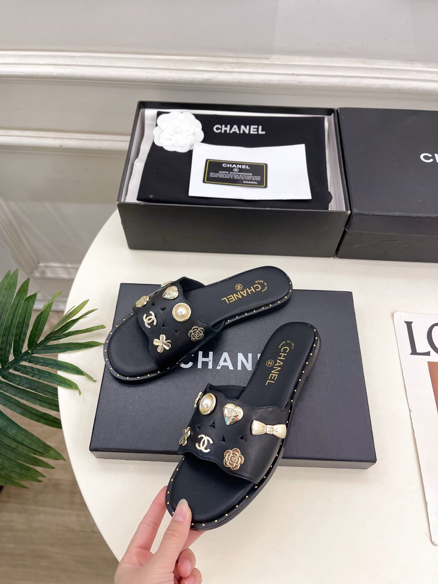 CHANEL 26S FLAT SANDALS IN BLACK LAMBSKIN CHARM-DECORATED