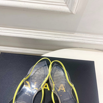 ALAIA 26S POINTED-TOE THONG SANDALS IN LIGHT YELLOW SATIN AND TRANSPARENT PVC