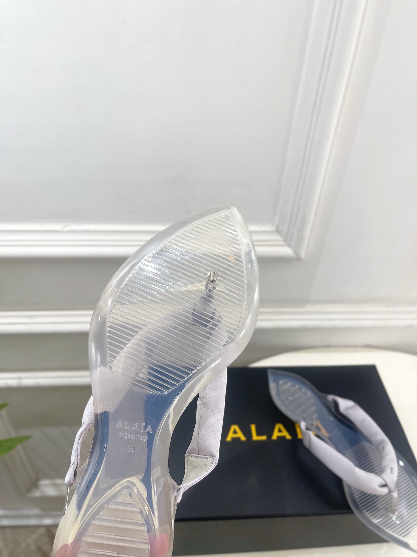 ALAIA 26S THONG SANDALS IN PEARL GREY SATIN AND TRANSPARENT PVC