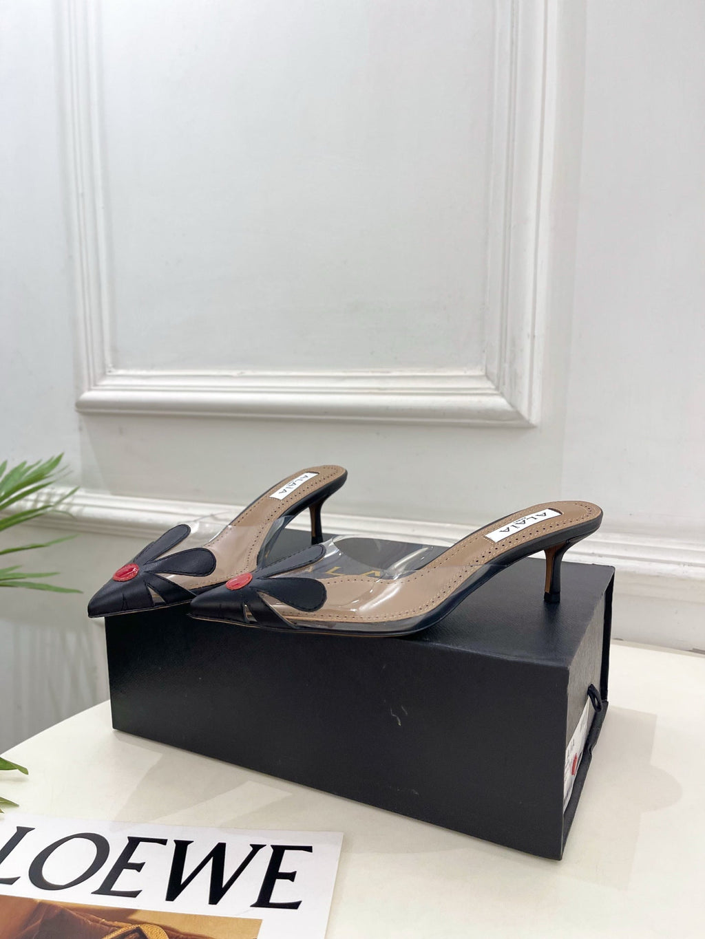 ALAIA 26S MULE HEELS 55 MM IN BLACK LAMBSKIN AND TRANSPARENT PVC