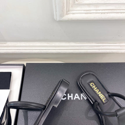 CHANEL 26S THONG SANDALS IN BLACK LAMBSKIN WITH GOLD TONE CC LOGO